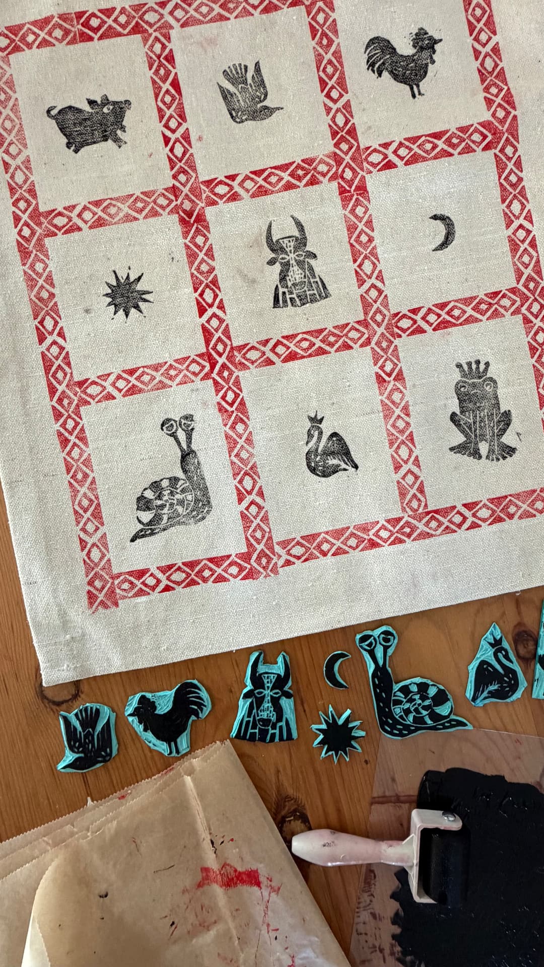 Red and black hand-printed animal textile