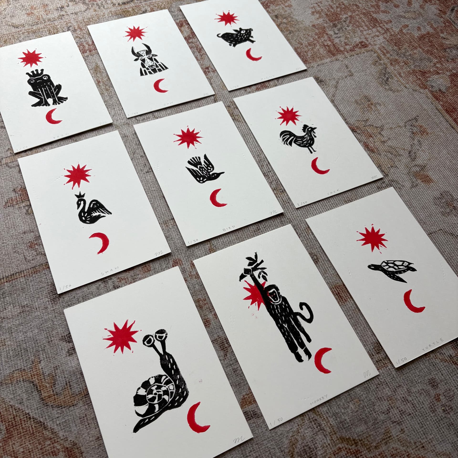 A selection of small hand-printed lino designs