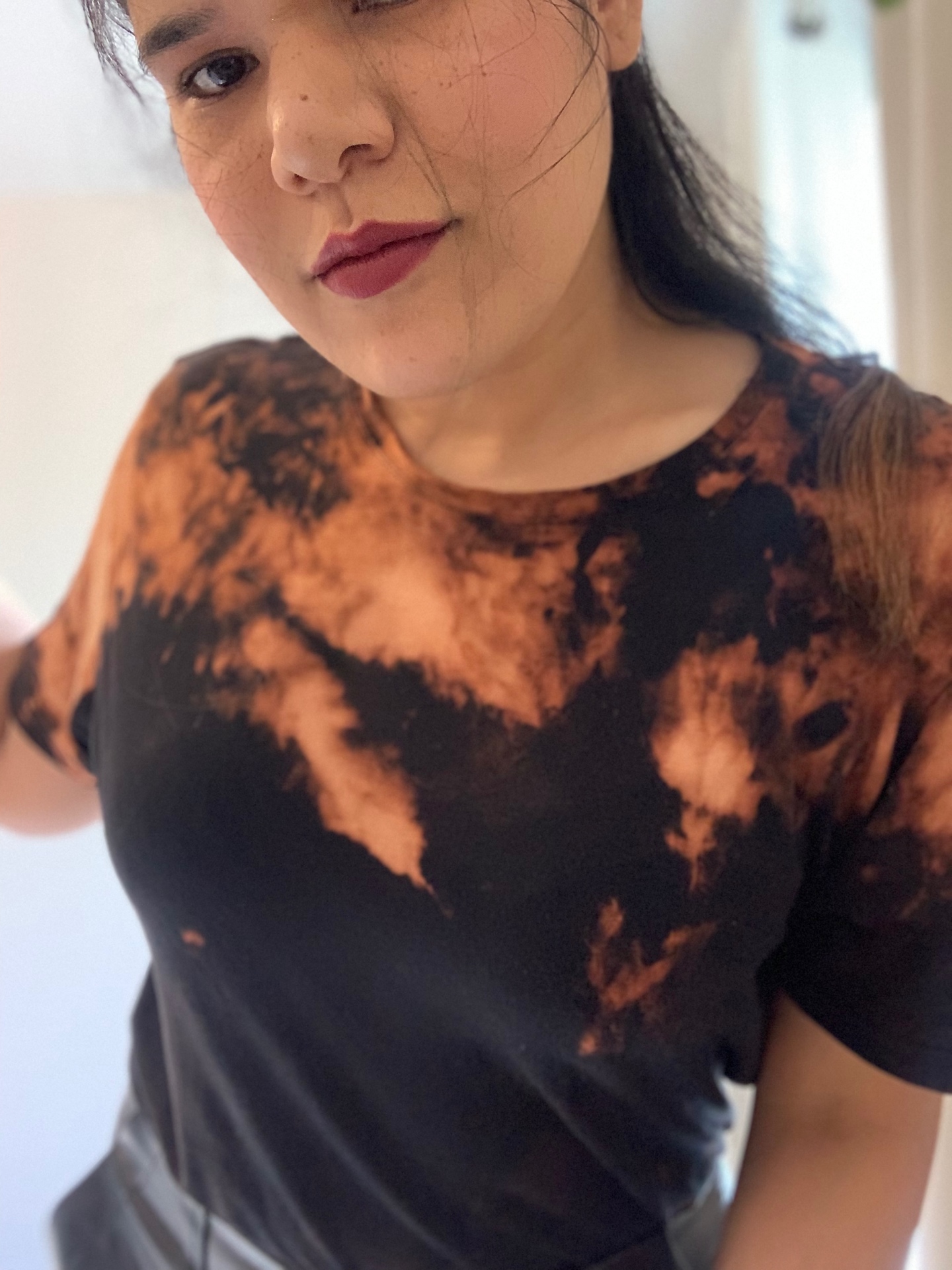 Upcycled bleach-dyed black tee