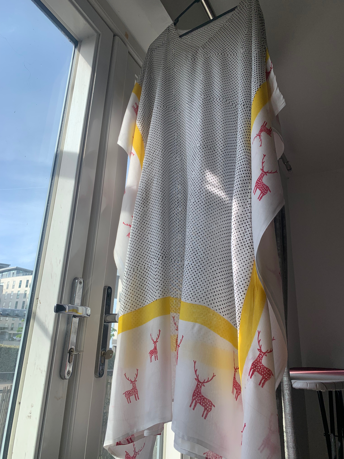 Hand-printed kaftan with deer motifs