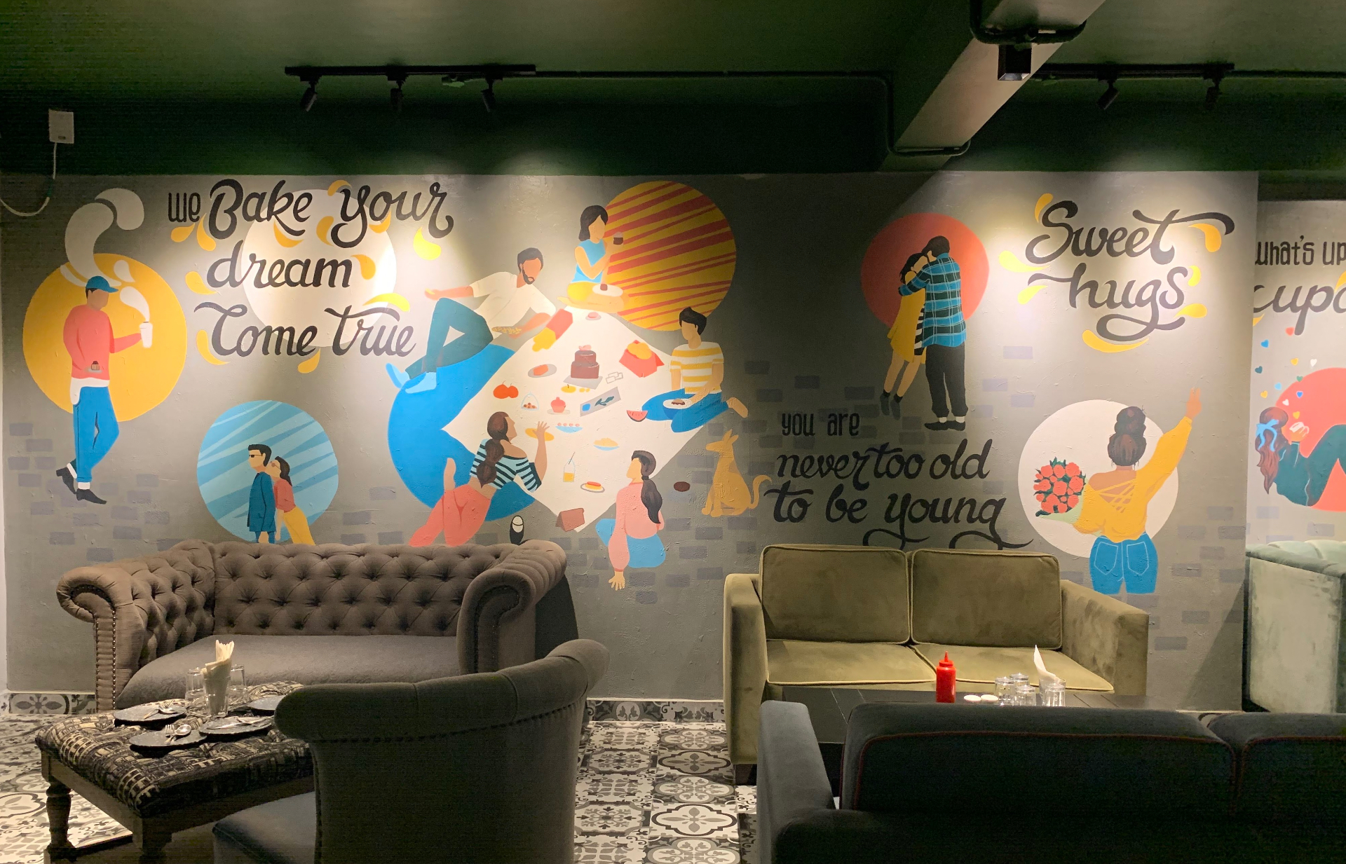 Bakery interior mural with hand-lettered quotes