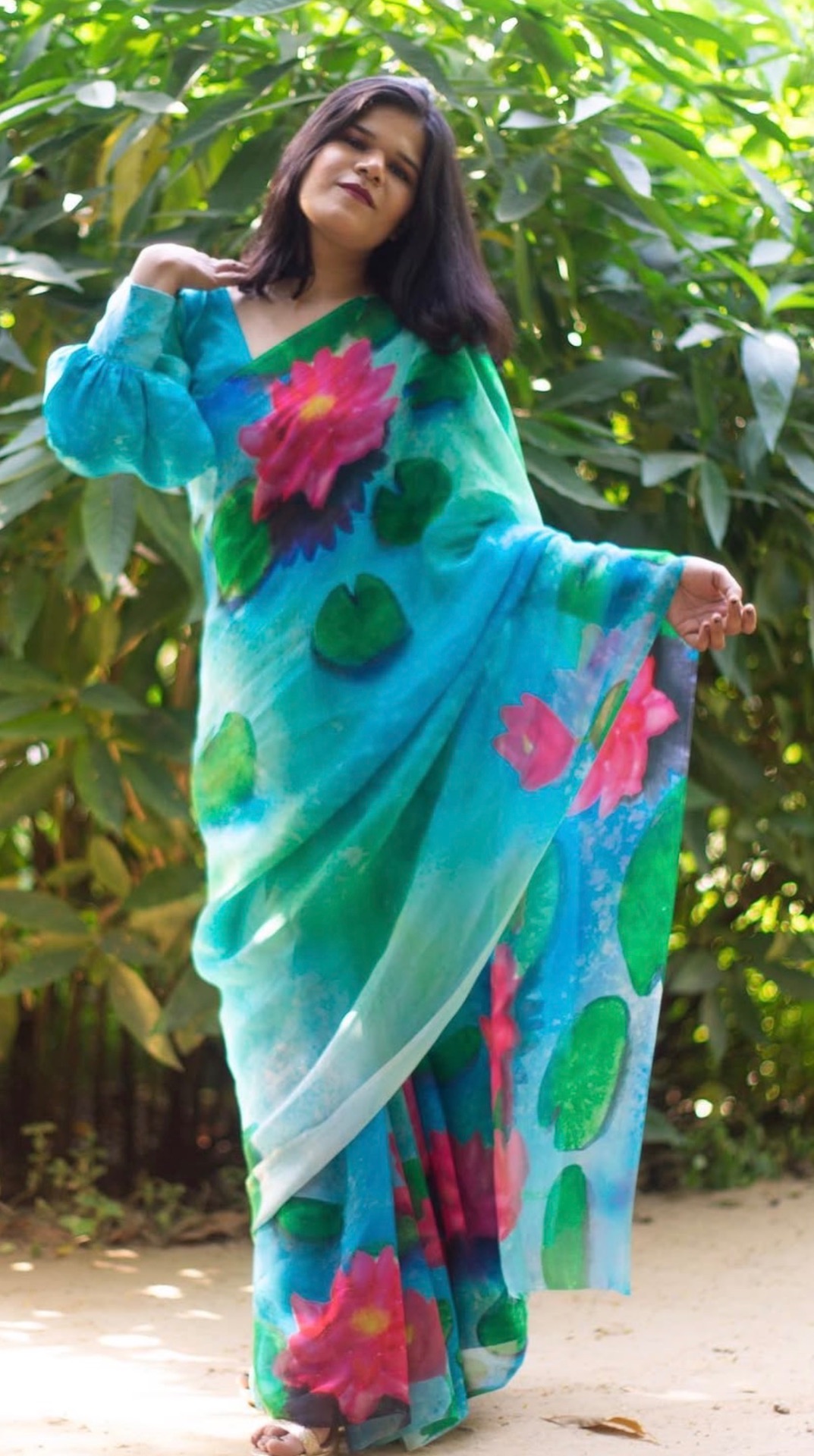 Hand-painted lotus saree in turquoise chiffon